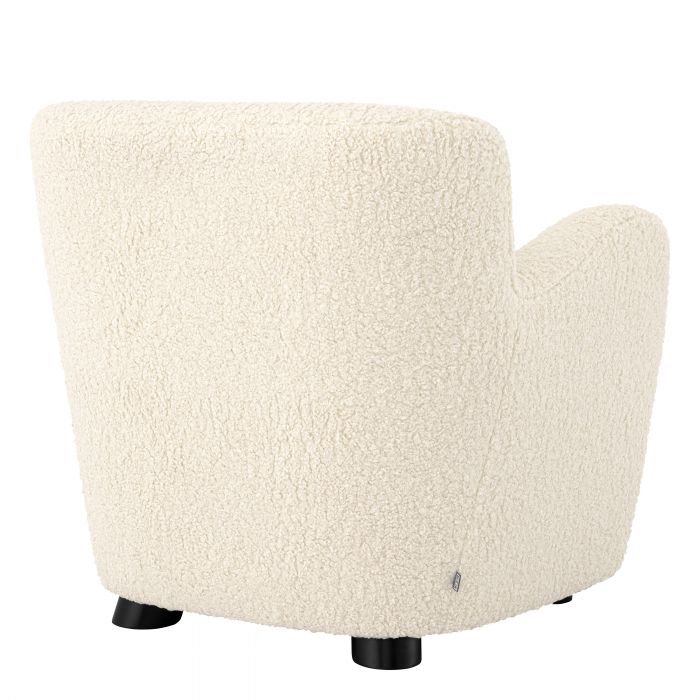 Fauteuil Eichholtz Bixby en fausse peau de mouton